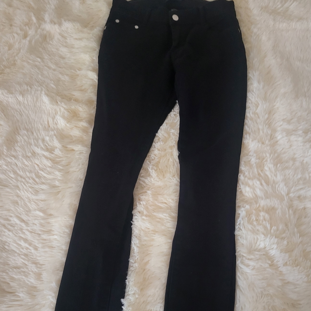 Black jeans size 3/4 from shein . Has the ripped design but is in back of legs .